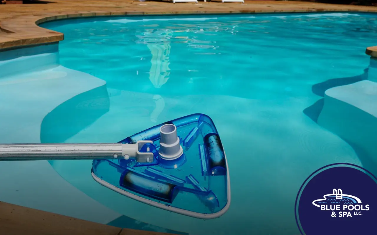 Expert maintaining a pool in NYC, showcasing clear water